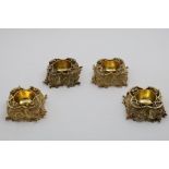 A SET OF FOUR LATE 19TH CENTURY GERMAN CAST SILVERGILT SALTS of quatrefoil outline with pierced