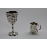 AN EARLY 20TH CENTURY MUG of baluster form on a domed and spreading foot, by E.W. Haywood,
