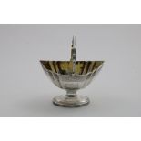 A GEORGE III SWING-HANDLED SUGAR BASKET with bright-engraved border decoration, two shield