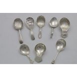 EIGHT VARIOUS EDWARDIAN AND LATER CADDY SPOONS mixed makers and dates; the largest one 4" (10 cms)