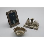 A LATE 19TH CENTURY CONTINENTAL INKSTAND with two mounted glass ink bottles and a central candle