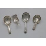 A GEORGE III "PASTERN HOOF" CADDY SPOON with engraved decoration, initialled, by Cocks &