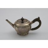 AN EARLY 20TH CENTURY IRISH BULLET TEA POT in the early 18th century manner, with a detachable