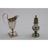 A GEORGE III BALUSTER PEPPER CASTER on a circular pedestal foot with bead borders, a domed cover and