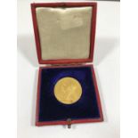 A DIAMOND JUBILEE GOLD MEDAL. A Victorian Diamond Jubilee medal, 1897, unmarked, 26mm, 13g. In