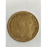 AN 'OLD HEAD' Half Sovereign. A Victorian 'Old Head' half Sovereign dated 1895.