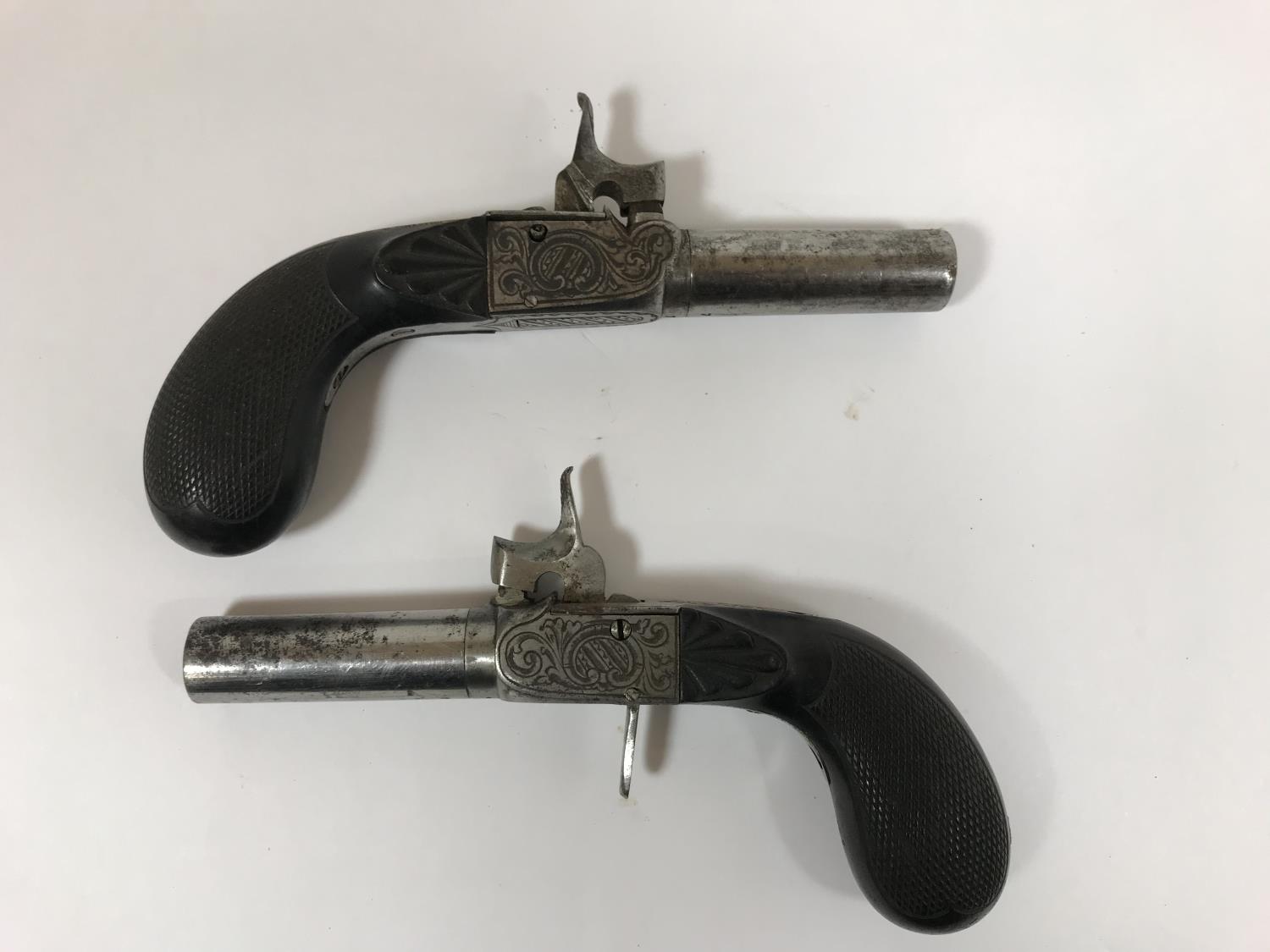 TWO PAIRS OF POCKET PISTOLS. A pair of percussion cap pocket pistols with octagonal screw off - Image 4 of 8