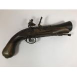 A BRASS BARREL FLINTLOCK BLUNDERBUSS. A flintlock blunderbuss type pistol with flared brass