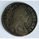 A WILLIAM III SHILLING. A William III Shilling dated 1697.