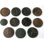 A COLLECTION OF LATE 18th CENTURY COPPER TOKENS. A collection of copper tokens to include a