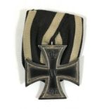 A GERMAN IRON CROSS. An Iron Cross, Second Class, First World War, dated 1914, on ring suspension