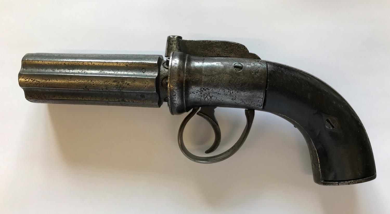 A PEPPER BOX TYPE REVOLVER. An English Six Barel Pepper Box type revolver with a rotating 8cm barrel - Image 2 of 4