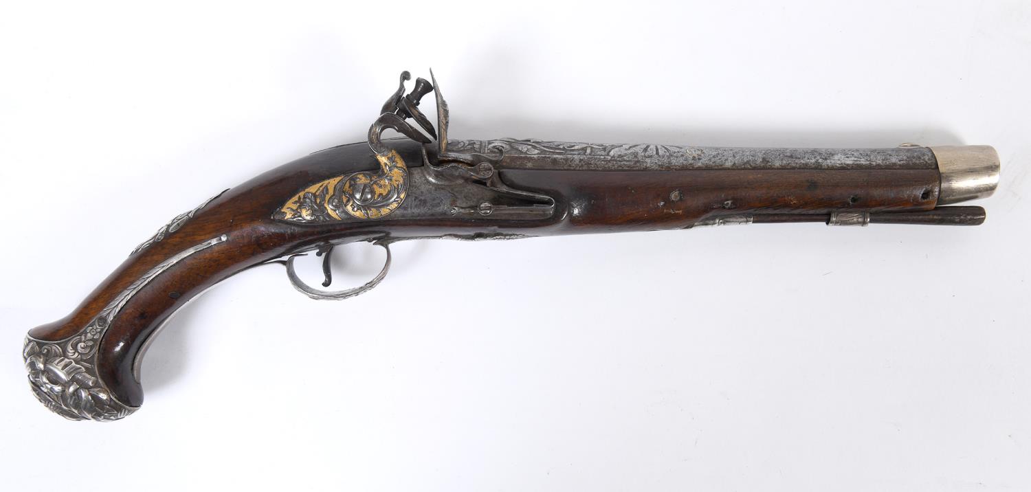 A SILVER MOUNTED HOLSTER PISTOL BY RICHARD WILSON. An 18 bore flintlock holster pistol with silver