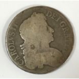 A CHARLES II CROWN. A Charles II Crown, date obscured by rubbing, the edge 'Vicesimo' (1668),