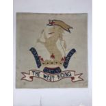 A DUKE OF WELLINGTON'S REGIMENT WOOL-WORK PANEL. The panel worked with the badge of the Duke of