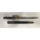 AN INDIA PATTERN MARK II BAYONET. An India Pattern Baynoet, unfullered 30.5cm blade with no false