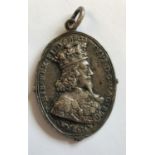 A CHARLES I ROYALIST BADGE BY T. RAWLINS. Charles I and Henrietta Maria Royalist badge, Obv. Crowned