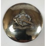 A 10TH GURKHA RIFLES BADGE. A 10th Gurkha Rifles Pipers sash badge, a broad circular disc centred by