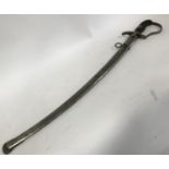 A NINETEENTH CENTURY GERMAN SWORD AND SCABBARD. The curved sword with a pointed tip and fuller