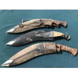 A SAM BROWNE BELT AND THREE KUKRI KNIVES. An Officers Sam Browne belt and shoulder strap with