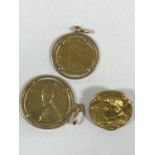 TWO SMALL GOLD PAPAL COPIN TYPE MEDALS. A Papal medal for Joannes XXIII mounted for suspension, a