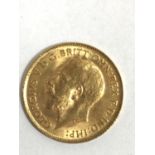 A HALF SOVEREIGN. A George V half Sovereign dated 1913.