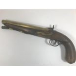 A MILITARY STYLE PERCUSSION CAP PISTOL BY T. KETLAND. A brass barrel Military style pistol by T.
