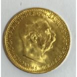 AN AUSTRIAN 10 KRONEN PIECE. An Autrian 10 Kronen piece bearing the date 1912. 3.3g.