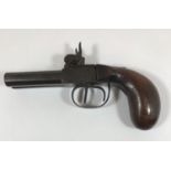 A 19TH CENTURY TWIN BARREL POCKET PISTOL. A small 19th century percussion cap firing pocket pistol