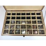 A LARGE COLLECTION OF UK AND WORLD COINS IN COLLECTORS BOX. A large collection of World coins to