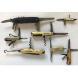 A COLLECTION OF SEVEN MULTI BLADED FOLDING KNIVES. A six blade knife with a 5.7cm blade marked