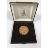 1080 MOSCOW OLYMPICS 100 ROUBLES COIN. A Russian 1978 100 Roubles coin celebrating the 1980 Moscow