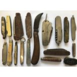 A COLLECTION OF THIRTY PRUNING AND FOLDING KNIVES. A collection of thirty folding knives and part