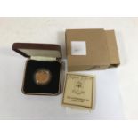 A GIBRALTAR £50 GOLD COIN. A Royal Mint £50 gold coin, in original capsule and case of issue, listed