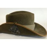 AN AUSTRALIAN ARMY SLOUCH HAT. An Australian Army pure wool slouch hat size 59 with 27th South