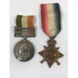 A KING'S SOUTH AFRICA MEDAL AND A 1914-15 STAR. A King's South Africa Medal with South Africa 1901