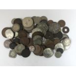 A COLLECTION OF WORLD COINS Coins from various countries including Australia, India, British West