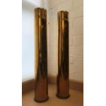 TWO SECOND WORLD WAR SHELL CASINGS. Two German Great War shell casings, 10cm at the base, with