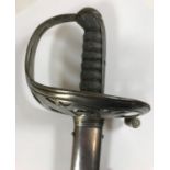 AN AMERICAN NON-REGULATION SWORD AND SCABBARD. A non-regulation foot officers sword and scabbard,