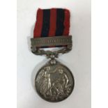 AN INDIA GENERAL SERVICE MEDAL. An India General Service Medal with Waziristan 1894-95 clasp named