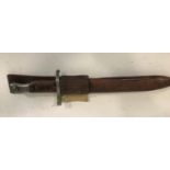 A FIRST WORLD WAR CANADIAN MK II ROSS BAYONET. A bayonet with single edged 25cm blade, with wooden