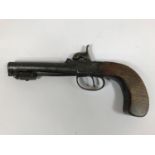 A PERCUSSION CAP PISTOL BY HARVEY OF EXETER. A small percussion cap pistol with round barrel and