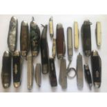 TWENTY ASSORTED FOLDING KNIVES TO INCLUDE A SCOUT KNIFE. 20 varied folding knives to include