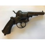 A CONTINENTAL PIN FIRE REVOLVER. With a 9.5cm barrel with decoratively engraved six shot chamber,