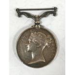 AN INDIAN MUTINY MEDAL 1857-58. An Indian Mutiny medal, lacking ribbon, named to T.Hambling, R.A.