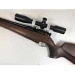 AN R.W.S. SERIES 50 .22 AIR RIFLE. An R.W.S. .22 Air Rifle with ten shot magazine, 10 x 42