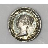 A VICTORIAN THREE-HALFPENCE, A COLLECTION OF THREEPENCE PIECES. A Three-Halfpence piece dated
