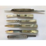 SIX SILVER FOLDING KNIVES AND 13 OTHER KNIVES. Four folding knives with silver blades hallmarked for