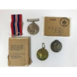 THREE SINGLE MEDALS. A First World War Victory medal to Private Philip H. Legg of the Wiltshire