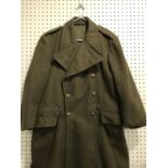 A COLLECTION OF FIVE MILITARY GREATCOATS. Five Greatcoats including an army coat 1951 pattern,